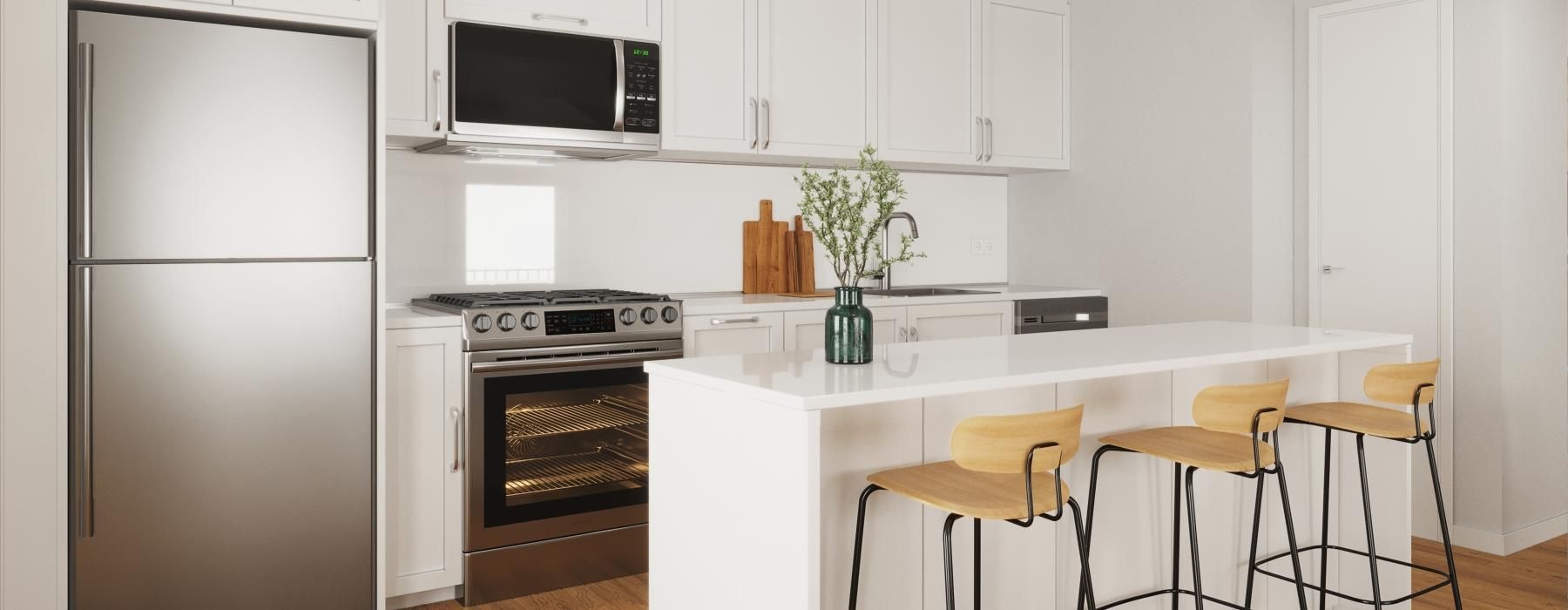 a kitchen with white cabinets
