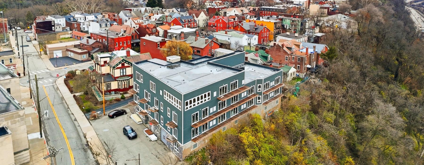 a city with many buildings and trees